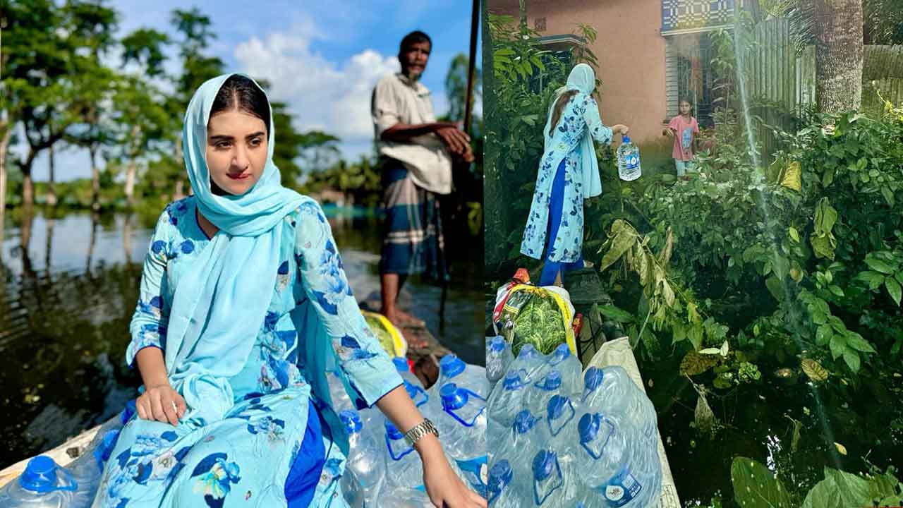 নৌকায় ঘুরে ঘুরে ত্রাণ বিতরণ করলেন বুবলী
