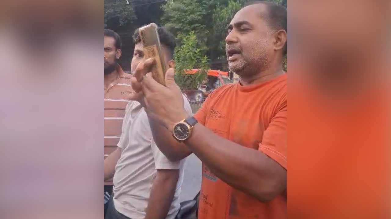 কমলা রঙের টি-শার্ট পরা নাঈমুজ্জামান নয়ন। ছবি : সংগৃহীত